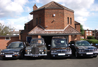 Fleet of funeral cars